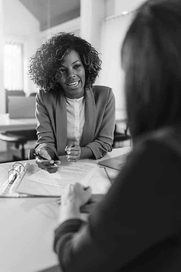 Female business representative talking to its consumer